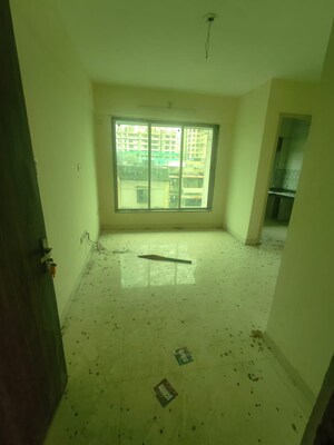 Living Room in 1 BHK Apartment at Arok Kinjal Residency, Agripada – for Sale