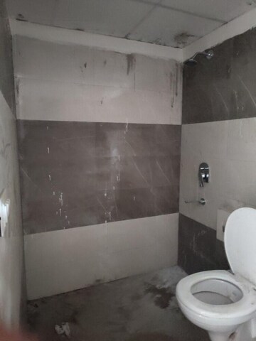 Bathroom in 3 BHK Apartment at Cosmos Express 99, Sector 99 – for Sale