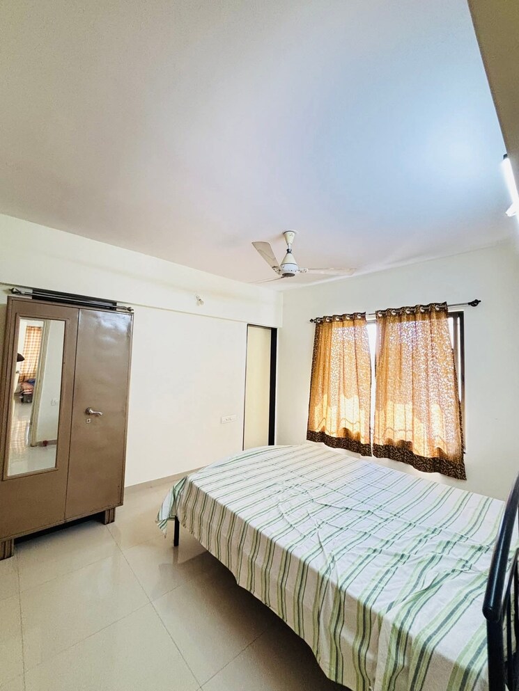 Bedroom, shiv-darshan-wakad 3 Bedroom 1000 Sq.Ft. Apartment In Wakad Pune 9114463