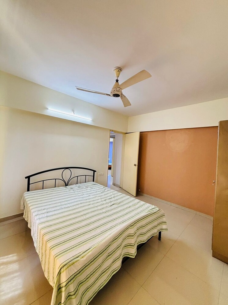 Bedroom, shiv-darshan-wakad 3 Bedroom 1000 Sq.Ft. Apartment In Wakad Pune 9114463