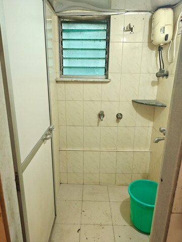 Bathroom in 1 BHK Apartment at Shree Ram Bhavan, Malad West – for Rent