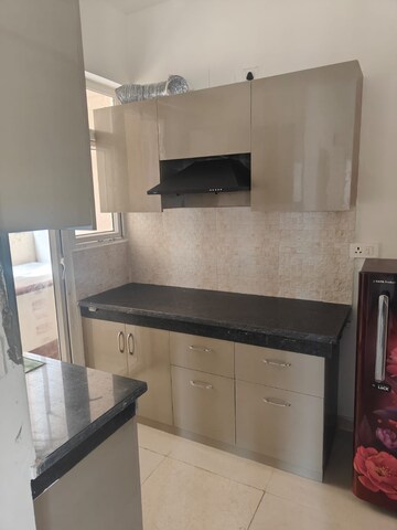 Kitchen in 2 BHK Apartment at Signature The Millennia 2, Garoli Kalan – for Rent