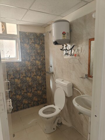 Bathroom in 2 BHK Apartment at Signature The Millennia 2, Garoli Kalan – for Rent