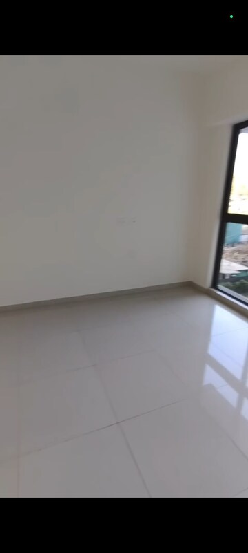 Master Bedroom in 2 BHK Apartment at Lodha Woods, Kandivali East – for Rent
