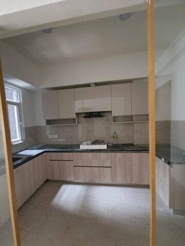 Kitchen in 3 BHK Apartment at Smart World Orchard, Sector 61 – for Rent