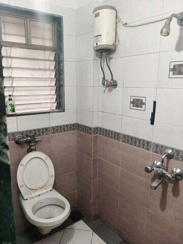 Bathroom in 1 BHK Apartment at Sadguru Complex I, Goregaon East – for Rent