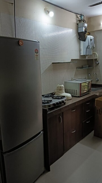 Kitchen in 3 BHK Apartment at Mahaveer Jeevan Deep, Kandivali West – for Sale