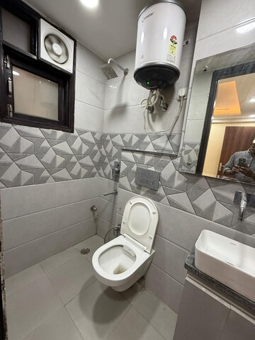 Bathroom in 1 BHK Apartment at Palm Residency Chhatarpur, Chattarpur – for Rent