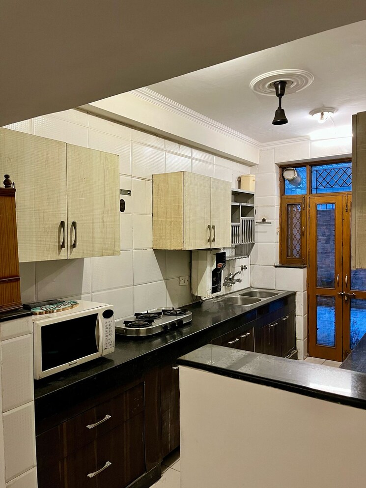 Kitchen, ansal-sushant-lok-i 3 Bedroom 215 Sq.Yd. Builder Floor In Sector 43 Gurgaon 9114949