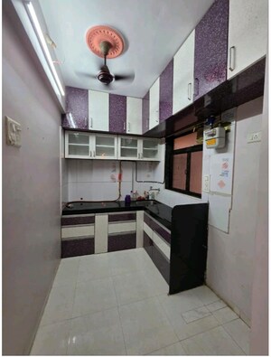 Kitchen in 1 BHK Apartment at Yashraj Park CHS, Kasarvadavali – for Sale