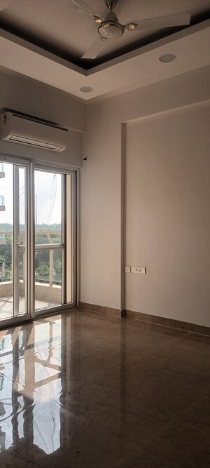 Living Room in 3 BHK Apartment at Ramprastha Platinum Height, Ramprastha Greens – for Sale