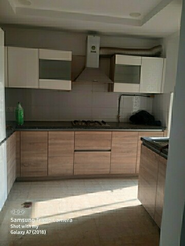 Kitchen in 3 BHK Apartment at Ramprastha Platinum Height, Ramprastha Greens – for Sale
