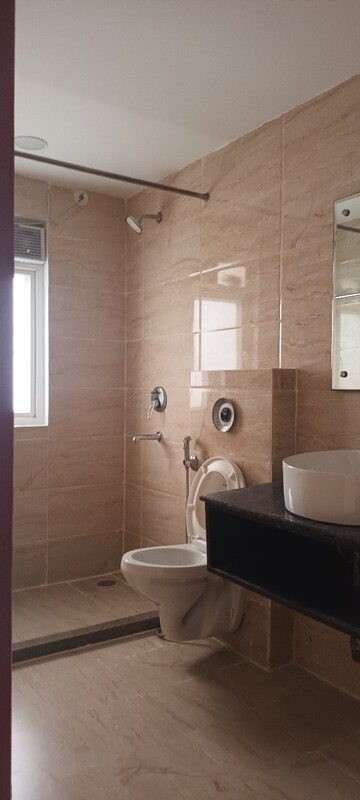 Bathroom in 4 BHK Apartment at Ramprastha Platinum Premier, Vaishali Sector 3 – for Sale