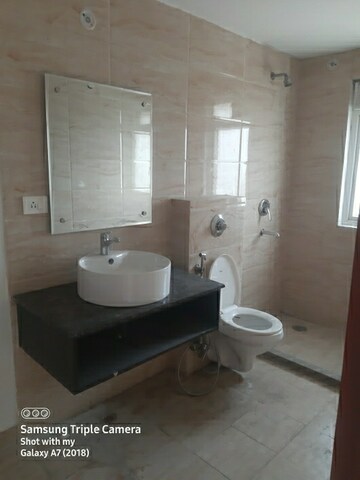 Bathroom in 4 BHK Apartment at Ramprastha Platinum Premier, Vaishali Sector 3 – for Sale