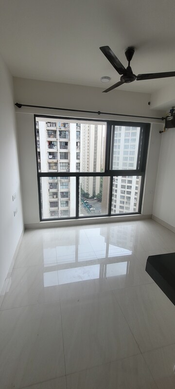 Living Room in 1 BHK Apartment at Lodha Crown Quality Homes, Majiwada – for Rent