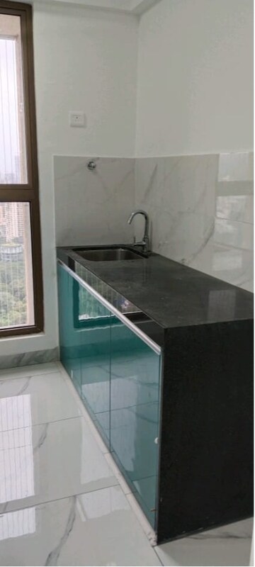 Kitchen in 1 BHK Apartment at Raymond Ten X Habitat, Pokhran Road No Two – for Rent