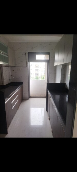 Kitchen in 1 BHK Apartment at SSB Ashok Nagar, Balkum Pada – for Sale