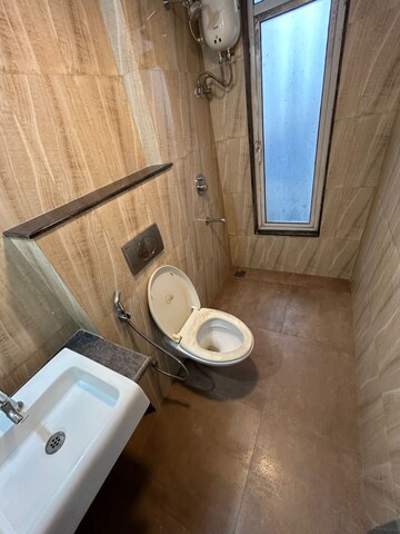 Bathroom in 1 BHK Apartment at Lodha Amara, Kolshet Road – for Rent