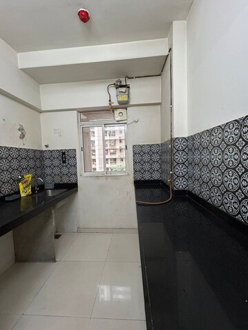 Kitchen in 1 BHK Apartment at Lodha Amara, Kolshet Road – for Rent