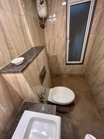 Bathroom in 1 BHK Apartment at Lodha Amara, Kolshet Road – for Rent