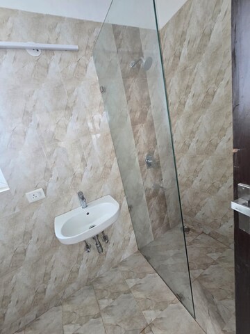 Bathroom in 3 BHK Apartment at Shapoorji Pallonji Joyville Phase 2, Sector 102 – for Rent