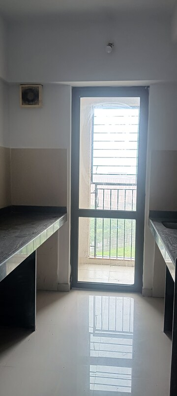 Kitchen in 1 BHK Apartment at Lodha Lakeshore Greens, Dombivli East – for Rent
