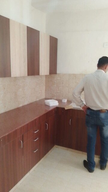 Kitchen in 2 BHK Apartment at Amrapali Golf Homes, Sector 4 Greater Noida – for Rent