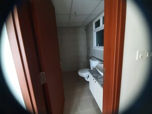 Building Lobby in 1 BHK Apartment at Bhartiya Nikoo Homes Phase 2, Thanisandra Main Road – for Sale