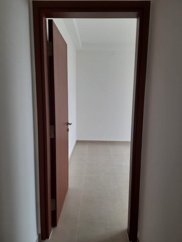 Building Lobby in 1 BHK Apartment at Bhartiya Nikoo Homes Phase 2, Thanisandra Main Road – for Sale