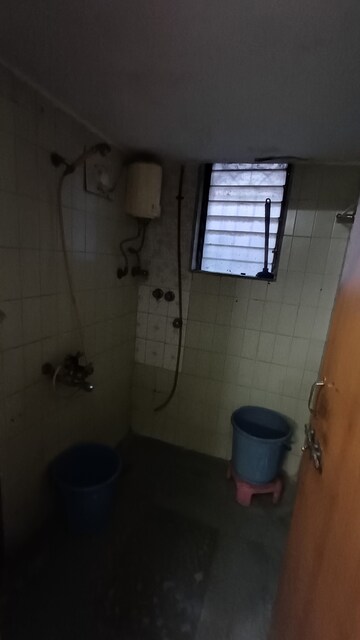 Attached Bathroom in 1 BHK Apartment at Mahavir Umang Building, Uthalsar – for Rent