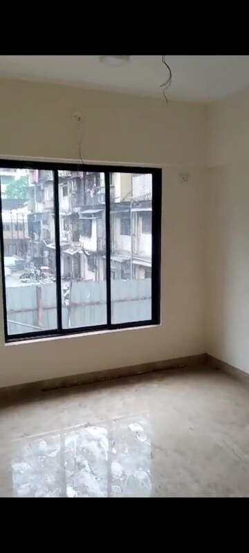 Room in 2 BHK Apartment at Mahanagar 11 Star, Agripada – for Sale