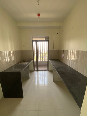 Kitchen in 2 BHK Apartment at Kalpataru Paramount A, Kapur Bawdi – for Sale