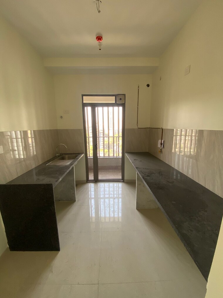 Kitchen, kalpataru-paramount-a 2 Bedroom 711 Sq.Ft. Apartment In Kapur Bawdi Thane 9116355