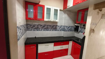 Kitchen in 1 BHK Apartment at Suyog CHS Naupada, Naupada – for Sale