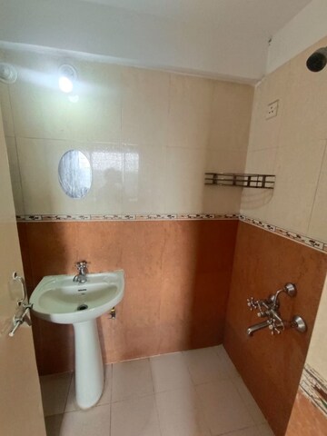 Bathroom in 3 BHK Apartment at Siddhivinayak Shubhashree Residential, Akurdi – for Rent
