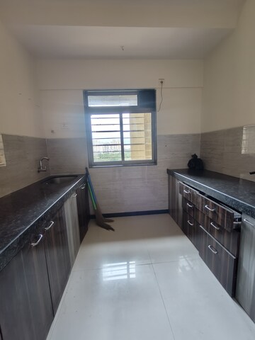 Kitchen in 3 BHK Apartment at Acme Ozone, Manpada – for Rent