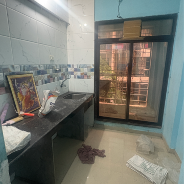 Kitchen in 1 BHK Apartment at Laxmi Aashirwad, Khandeshwar – for Rent