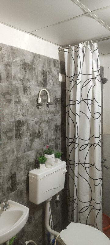Attached Bathroom in 1 BHK Apartment at Auric City Homes, Sector 82 – for Rent