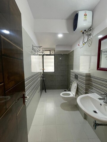 Bathroom in 4 BHK Apartment at The Ecos, New Town – for Rent
