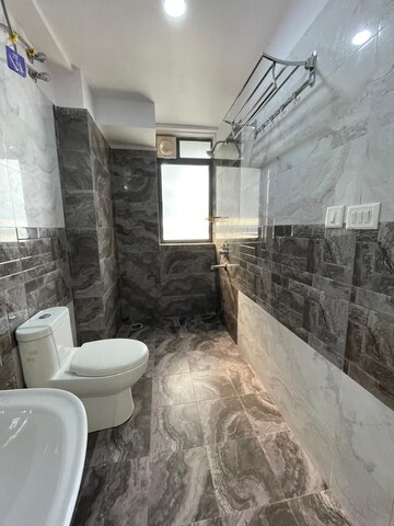 Bathroom in 4 BHK Apartment at The Ecos, New Town – for Rent