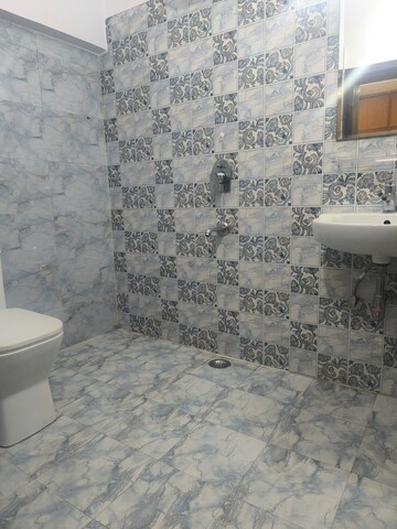 Bathroom in 4 BHK Apartment at Vasant Kunj – for Rent