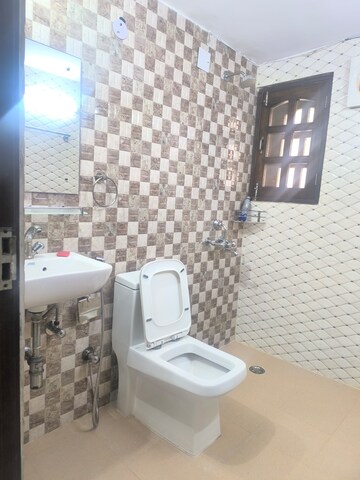 Bathroom in 4 BHK Apartment at Vasant Kunj – for Rent