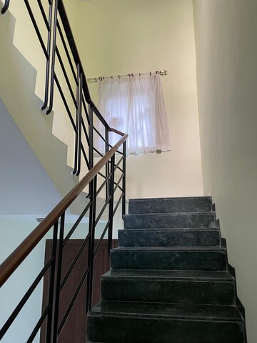 Staircase in 3.5 BHK Villa at Nirvana Country Birch Court, Sector 50 – for Rent
