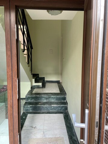 Staircase in 3.5 BHK Villa at Nirvana Country Birch Court, Sector 50 – for Rent