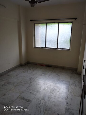Room in 2 BHK Apartment at Riddhi Gardens CHS, Malad East – for Rent