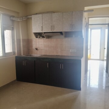Kitchen in 2 BHK Apartment at ROF Aalayas, Sector 102 – for Rent