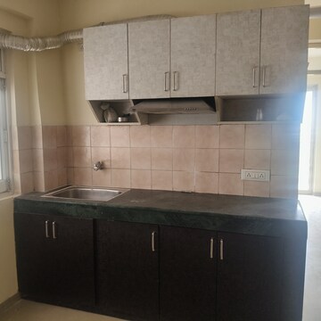 Kitchen in 2 BHK Apartment at ROF Aalayas, Sector 102 – for Rent