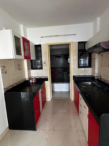 Kitchen in 2 BHK Apartment at Aatithya Avenue, Pimple Saudagar – for Rent