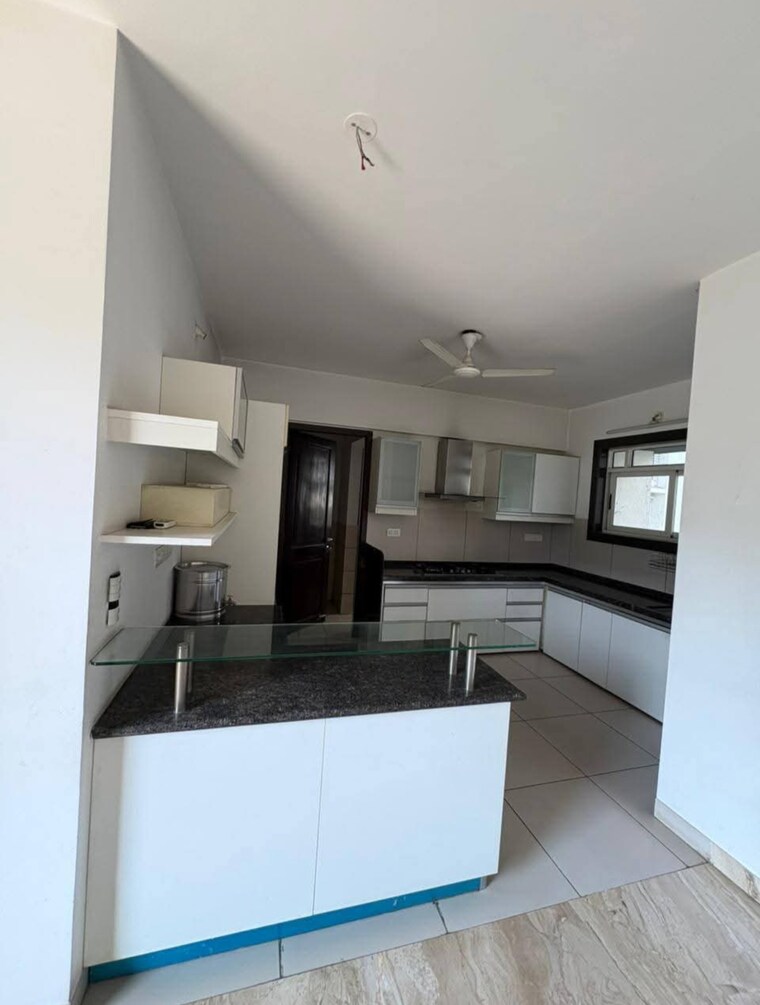 Kitchen, marvel-isola 3.5 Bedroom 2100 Sq.Ft. Apartment In Mohammadwadi Pune 9117433