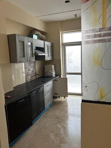 Kitchen in 3.5 BHK Apartment at Prateek Wisteria, Sector 77 – for Rent